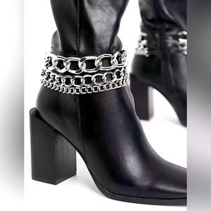 NWOTB Truffle Collection faux leather heeled knee high boots in blck. Size 10